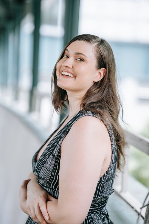 Womanly View A Side View of a Woman Smiling · Free Stock Photo