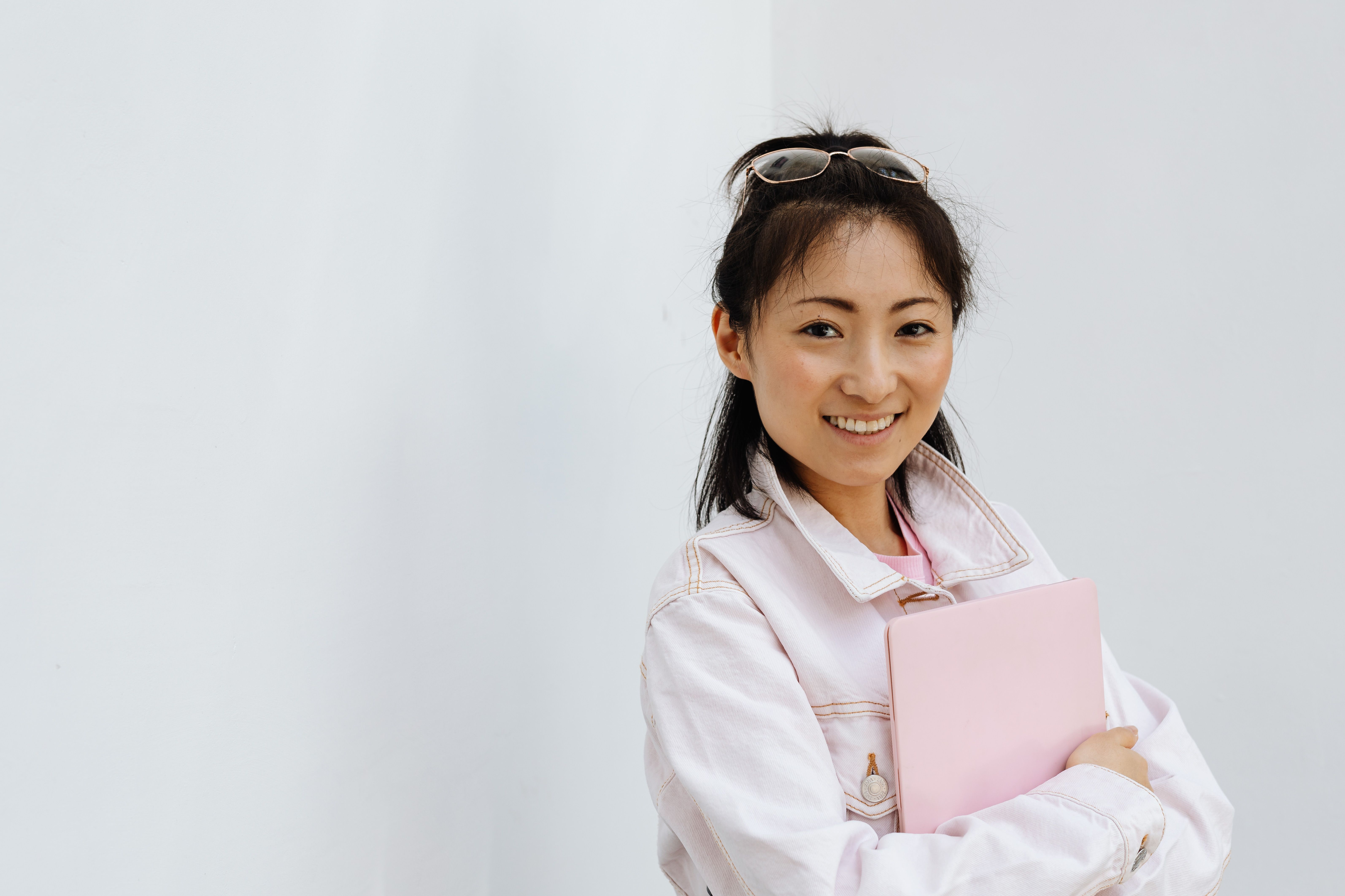 A Woman in White Blazer Smiling at the Camera · Free Stock Photo