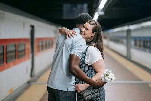 A Couple Hugging Together 