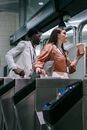 Man and Woman on a Turnstile