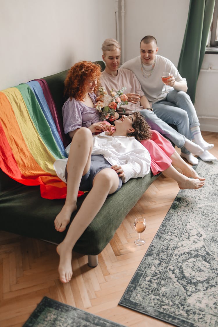 A Group Of Friends Chilling On The Couch