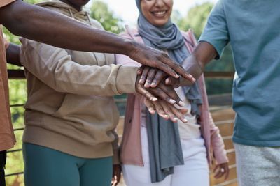 Supportive community hands together