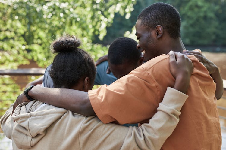 People In A Huddle 