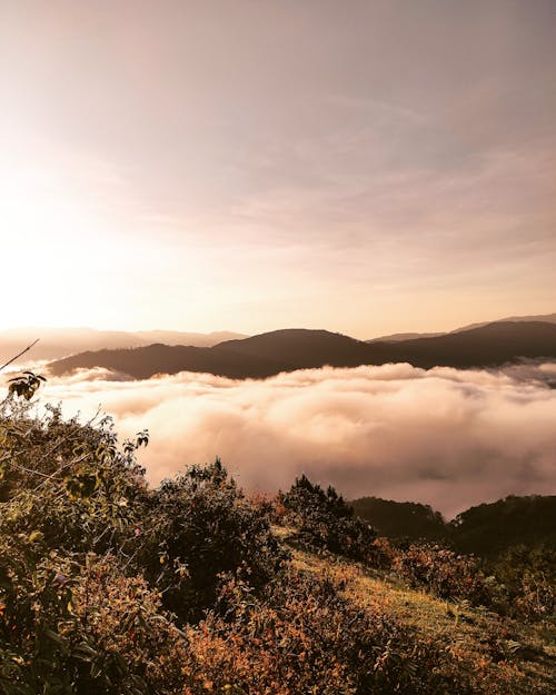 Aerial Photography of Cloudy Mountains during Sunrise