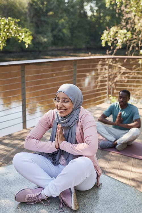 Free Woman Wearing Hijab Meditating Stock Photo