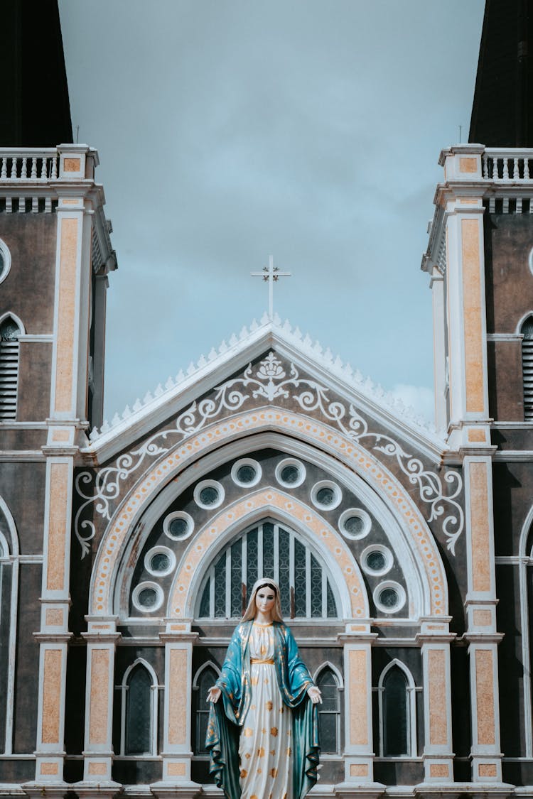 Statue Of Holy Mary By Church