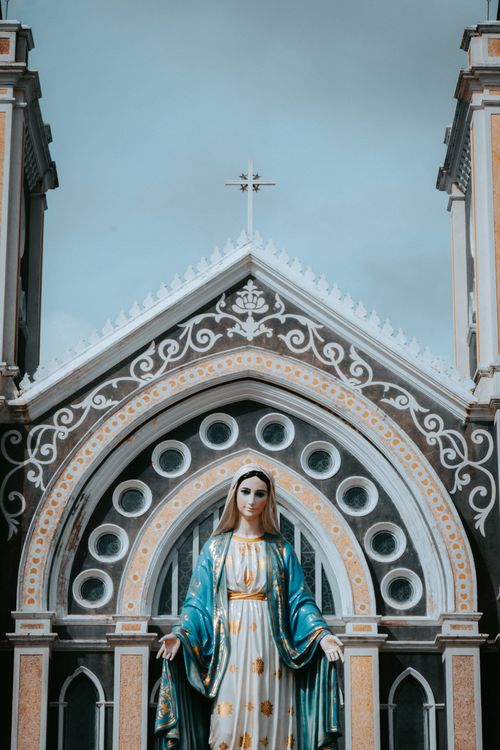 Free Gothic church facade featuring Virgin Mary statue in Chanthaburi, Thailand. Stock Photo