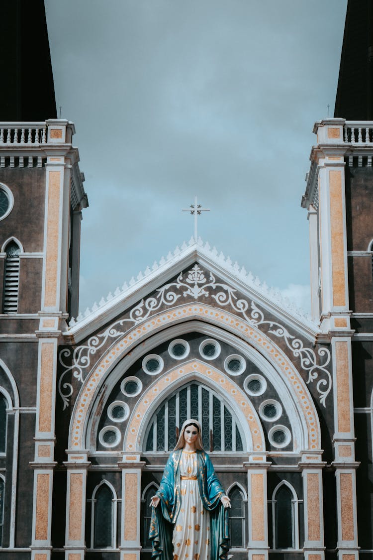 Catholic Church And Statue Of Holy Mary