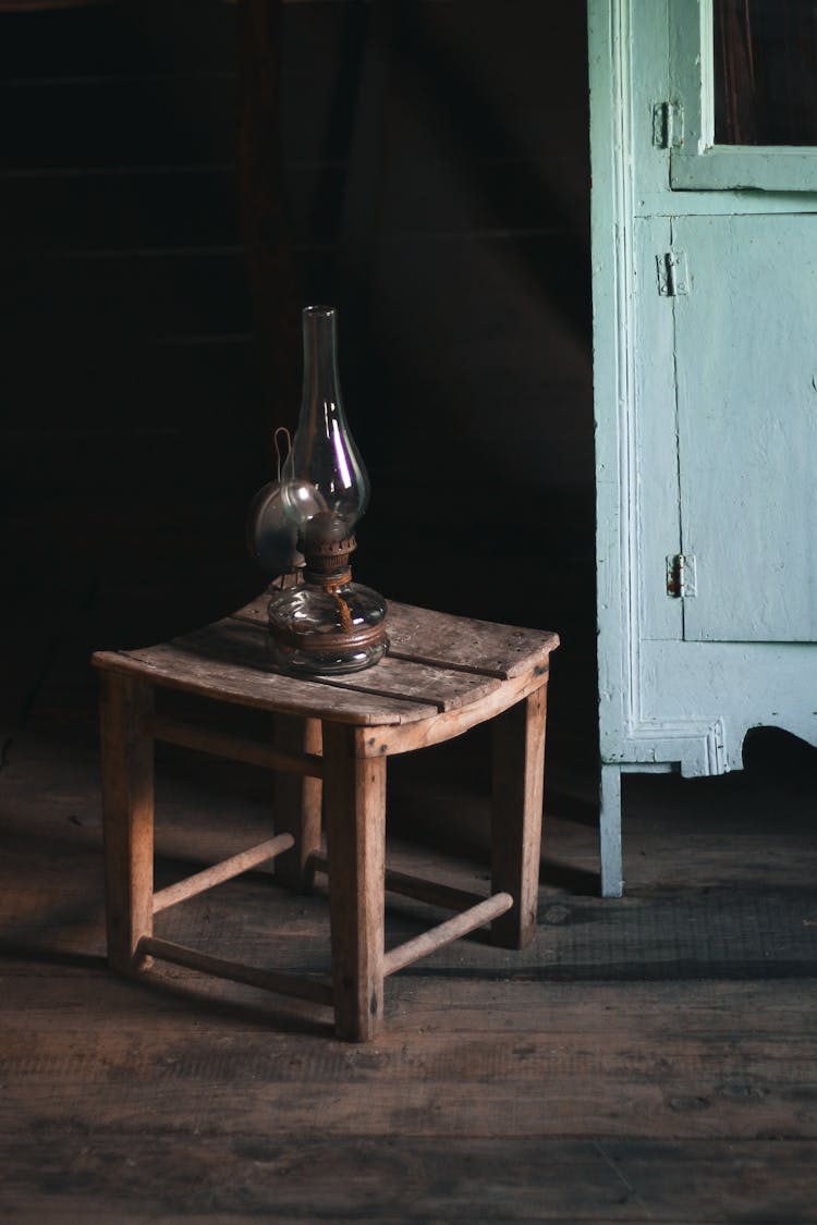 Kerosene Lamp On Stool