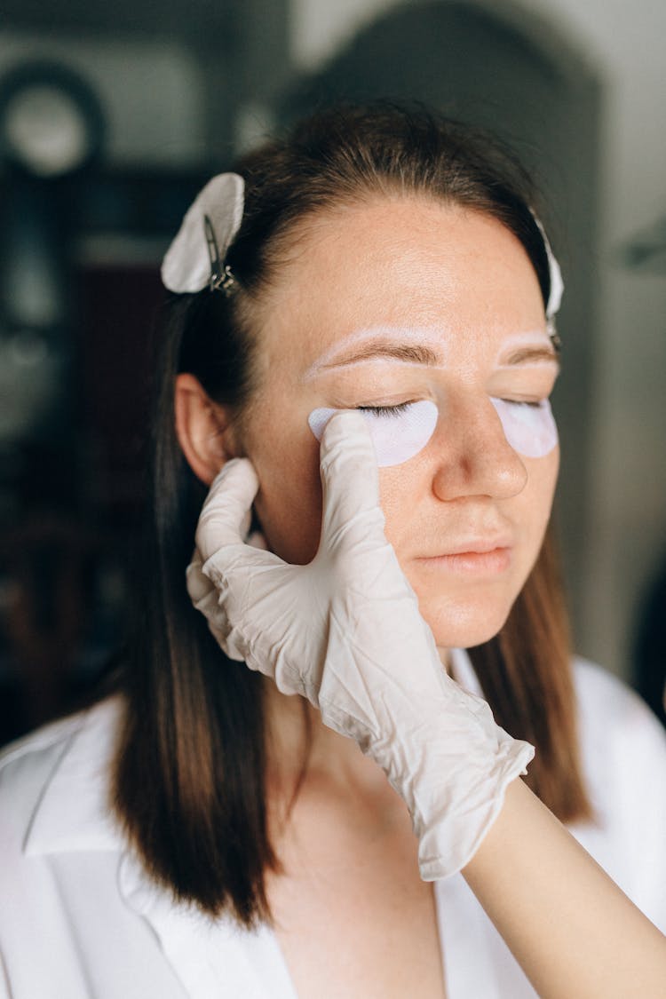 Woman In Under Eye Patches