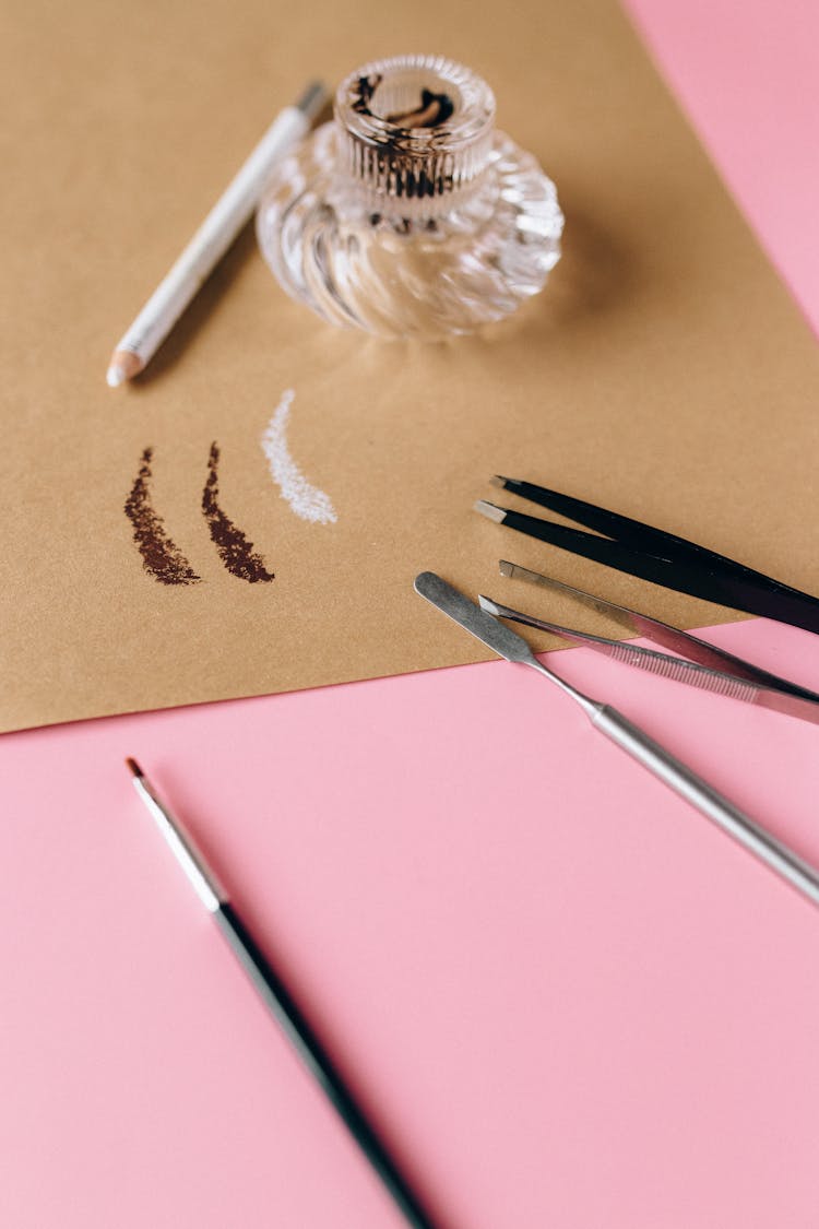 Cosmetic Tools On Pink Surface