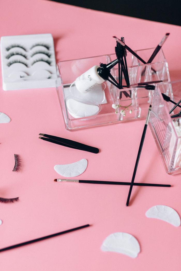 Lash tools and lashes on pink