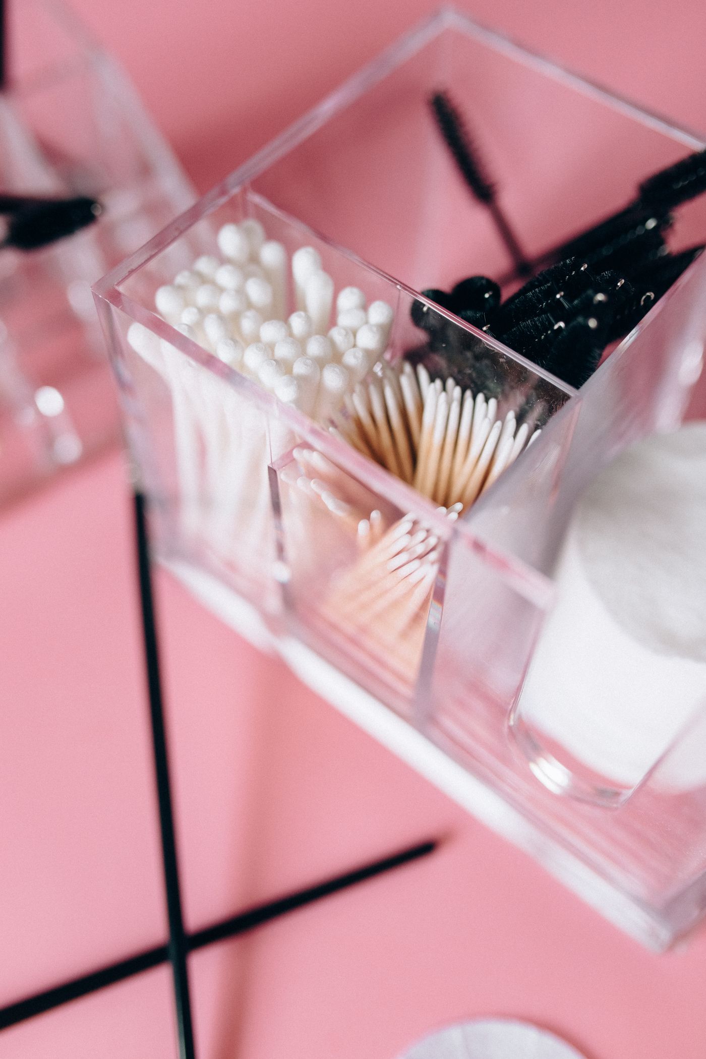 Makeup brushes and eye beauty tools arranged in a clear organizer