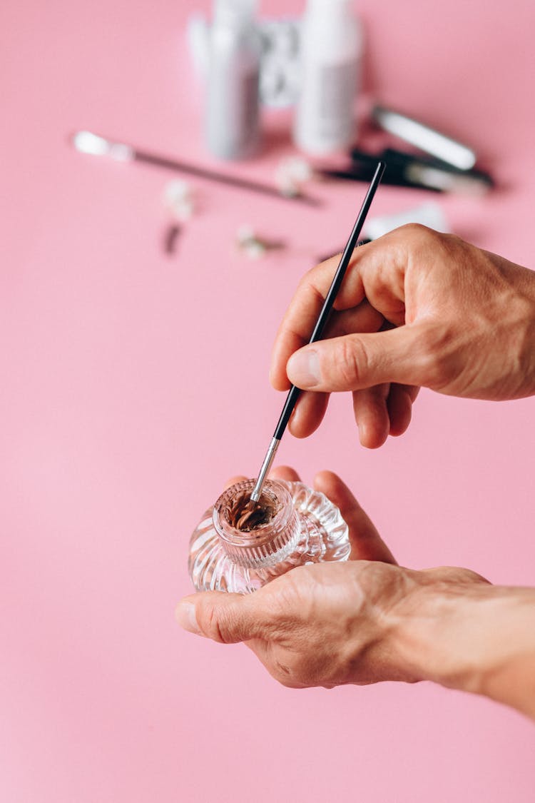 Man Hands Holding Brush And Glass