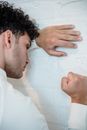 Man in White Dress Shirt Holding Womans Face