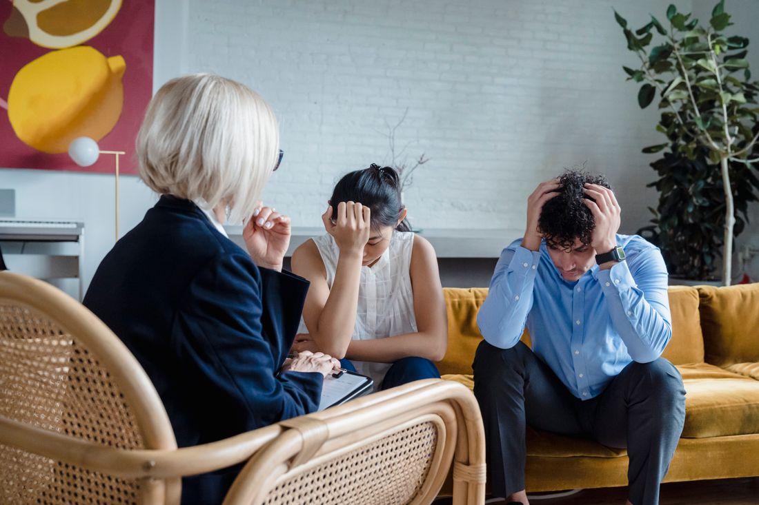 A couple participating in a therapy conversation