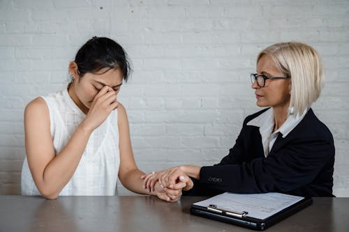 Young Woman Talking to a Therapist 