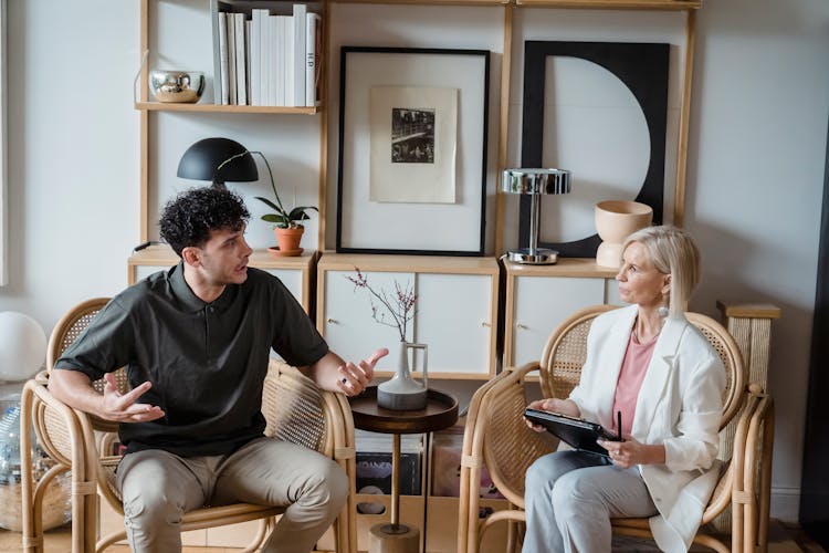 Adult Woman Listening To The Man Talking 