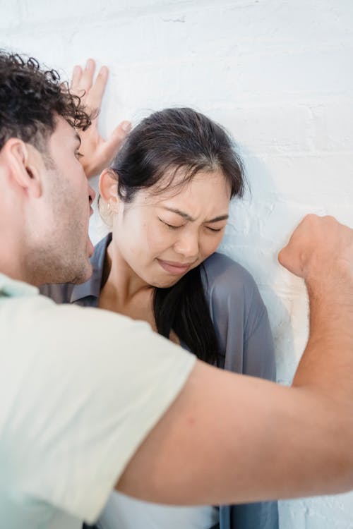 Free A Man Punching His Partner while Arguing Stock Photo