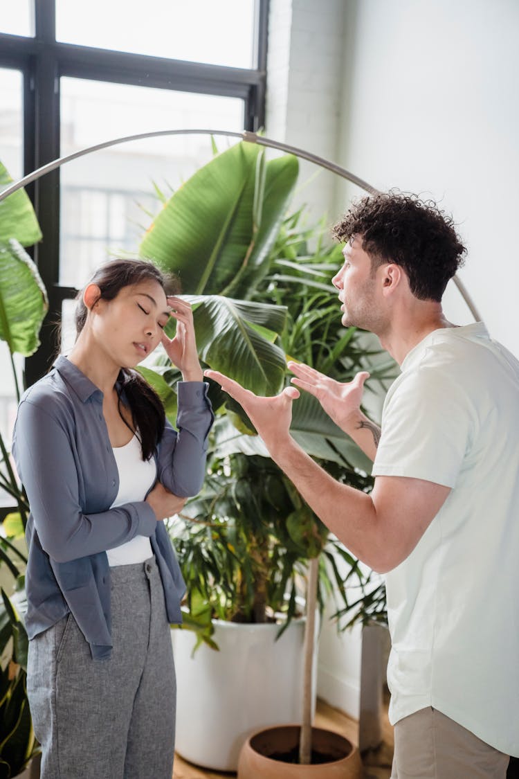 Angry Man Talking To A Woman