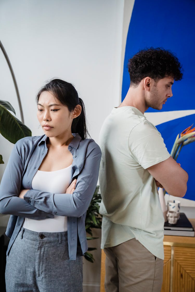 Angry Woman And Man Standing