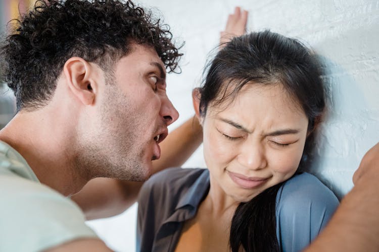 A Man Yelling To A Woman 