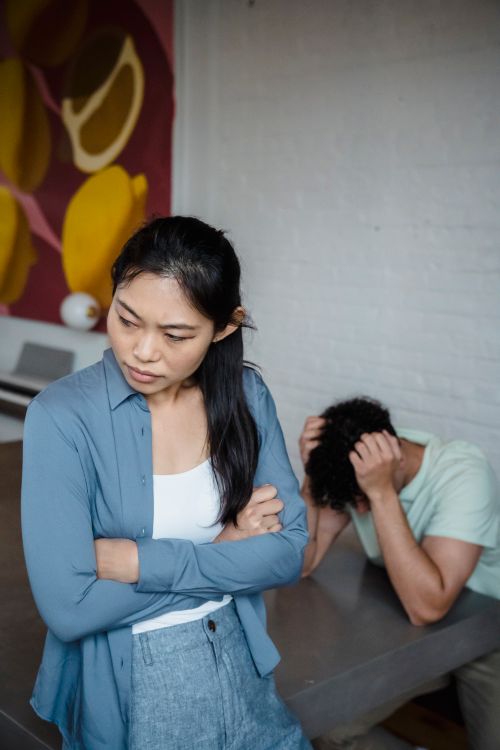 Free Image of a couple dealing with a serious relationship issue, displaying frustration and sadness. Stock Photo