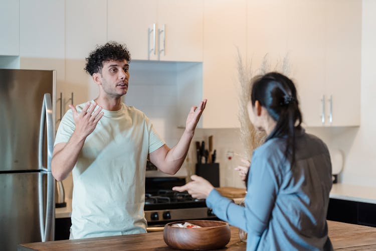 Couple Quarreling In Kitchen