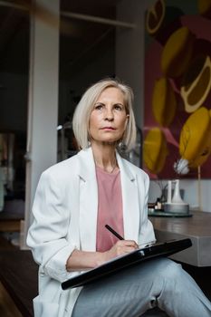Portrait of Mature woman in modern office