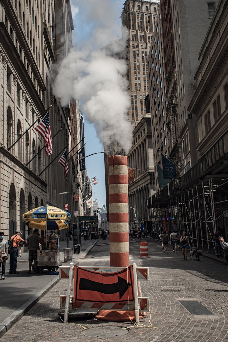 White Smoke Coming Out From Red And White Dirty Chimney