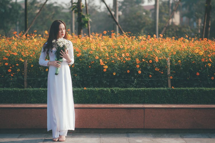 Single Sad Woman With Bouquet