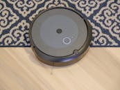 Modern Vacuum Cleaner on Wooden Flooring