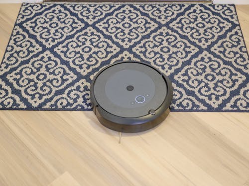 Free Vacuum Cleaner on Carpet  Stock Photo