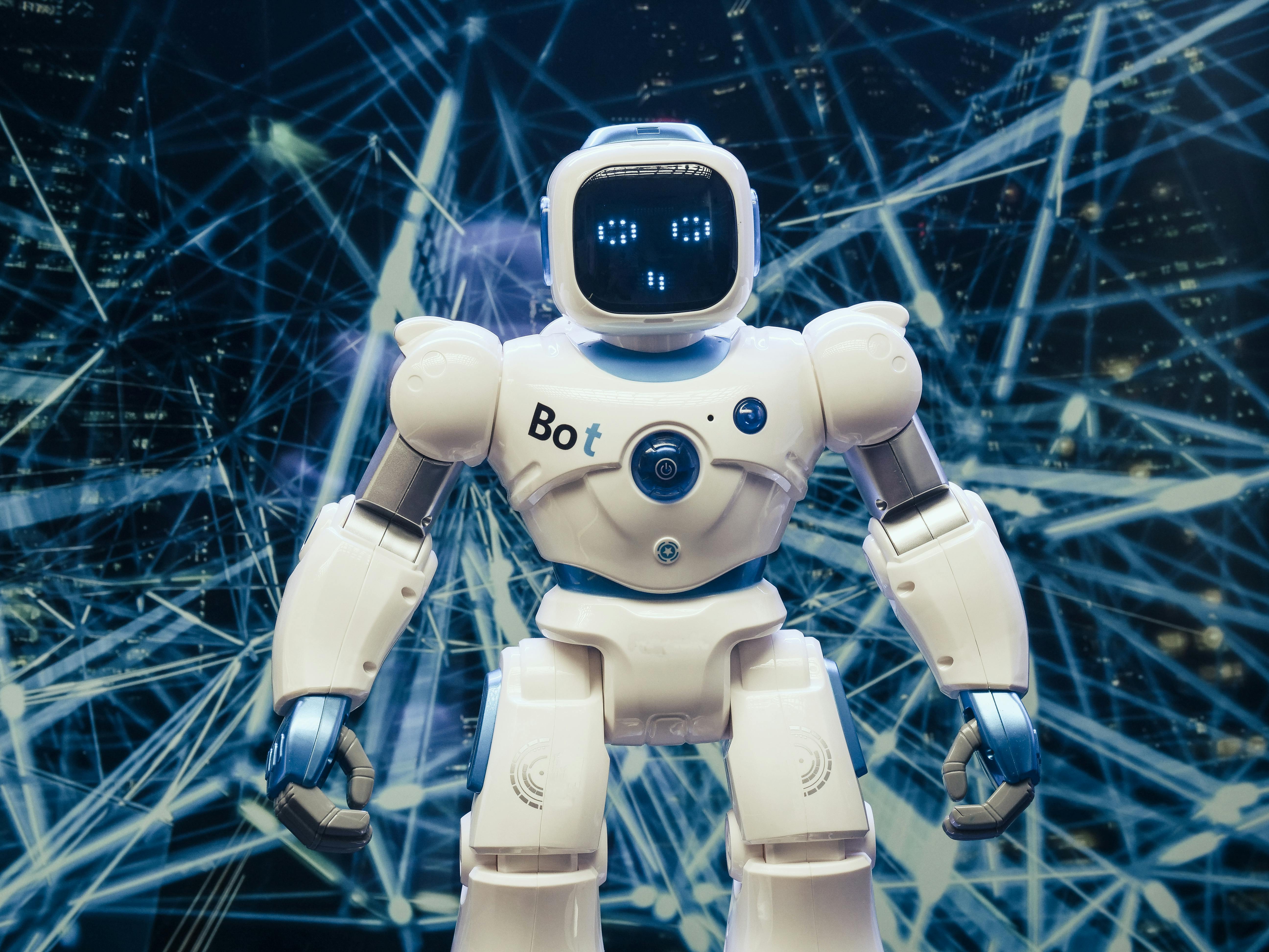 White and Blue Robot Figure · Free Stock Photo