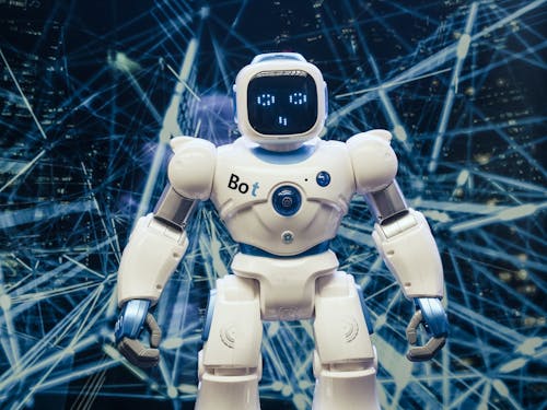 Free White and Blue Robot Figure Stock Photo