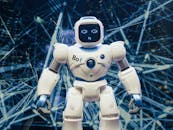 White and Blue Robot Figure