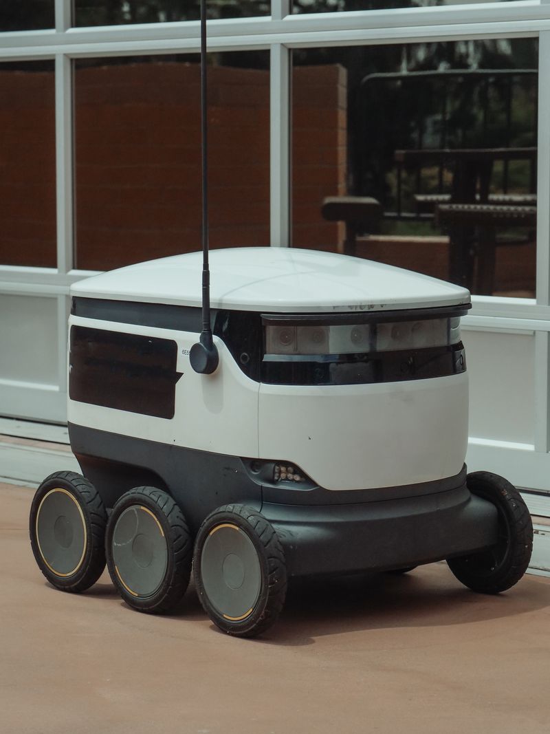 Autonomous delivery robot representing AI in logistics