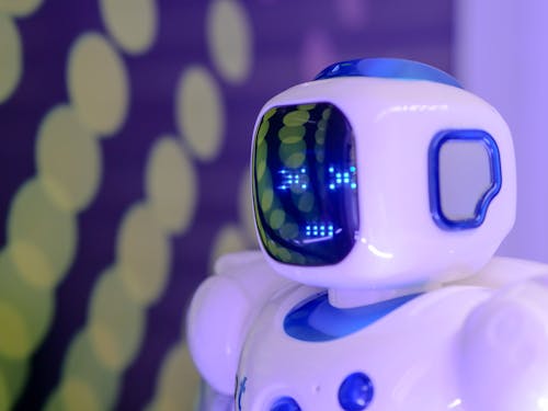 Free Close Up Photo of Blue and White Robot Toy Stock Photo