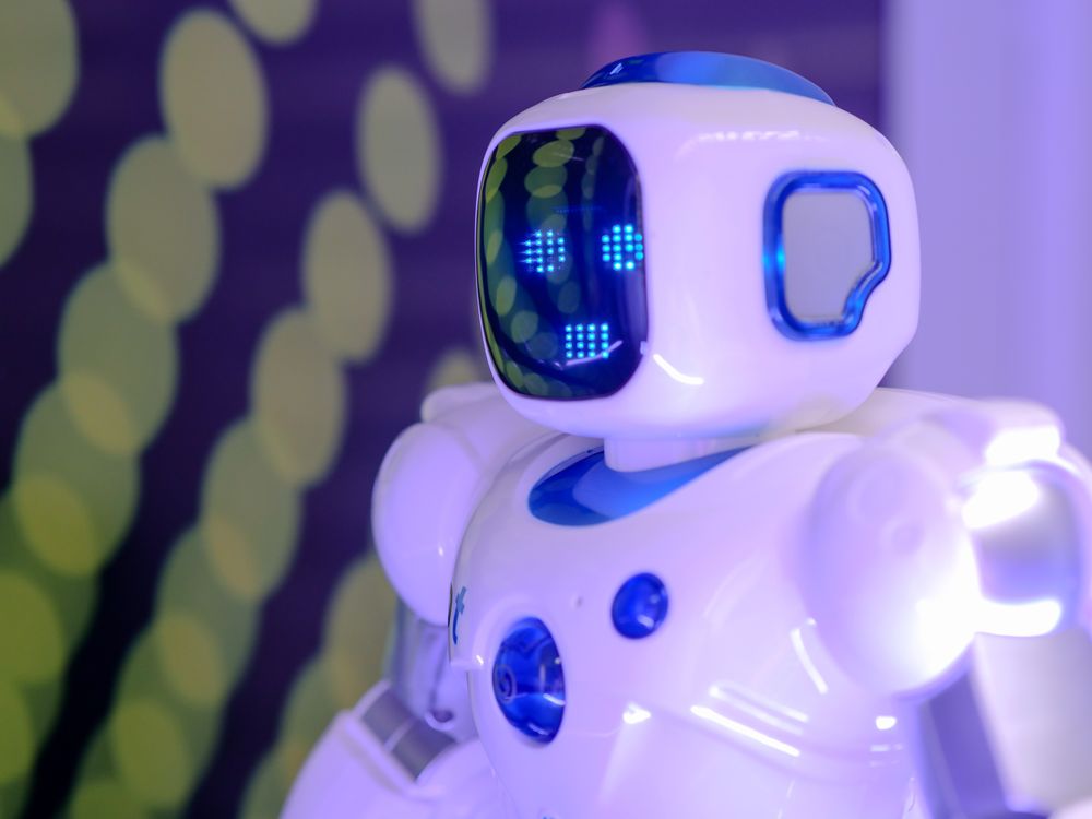Playful futuristic robot with a digital face