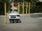 Black and White Delivery Robot