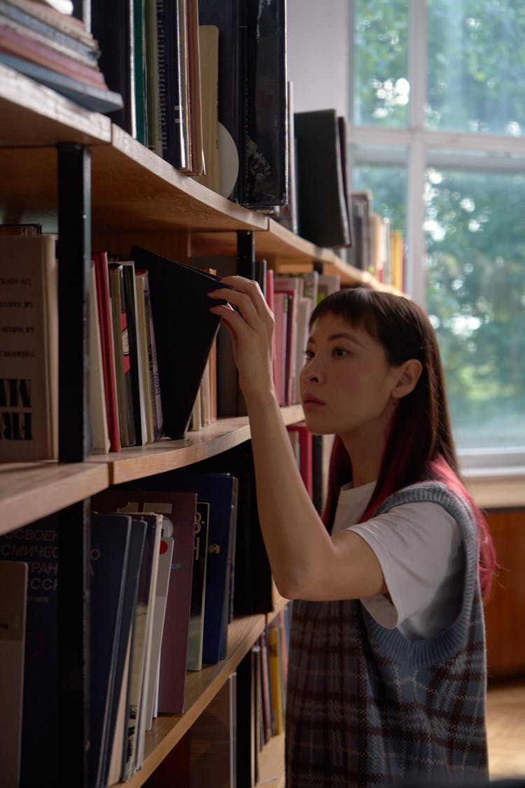 A Woman Browsing Books