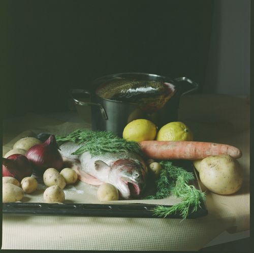 Free Fresh fish and vegetables arranged for rustic cooking, featuring colorful produce and vibrant tones. Stock Photo