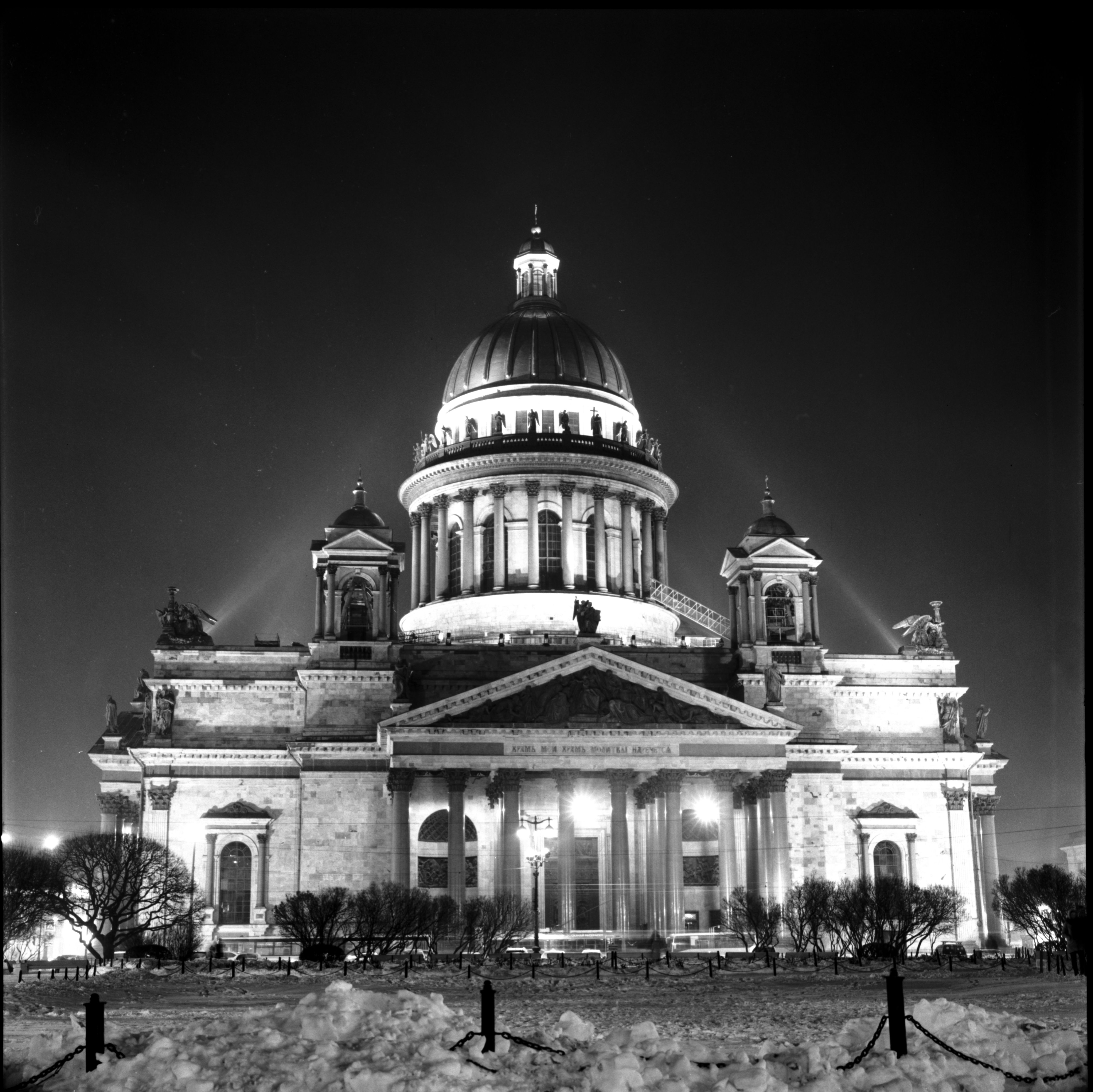 A stunning monochrome view of the illuminated St. Isaac's Cathedral in Russia at night.