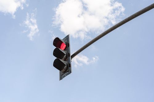 Free Red traffic light with blue sky and clouds in Gaziantep, Turkey. Stock Photo