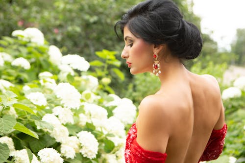 Back of Woman near Flowers