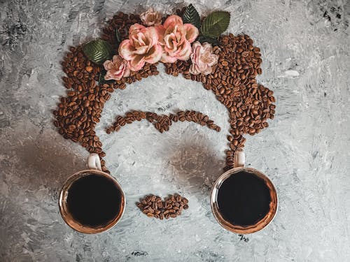 Free Coffee Art with Brown Coffee Beans on Gray Surface Stock Photo