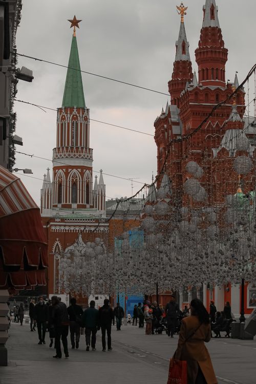 Free A bustling scene at Red Square, Moscow with famous red architecture and a crowd in winter. Stock Photo