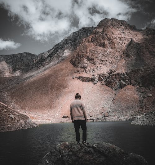 Man Standing on a Rock