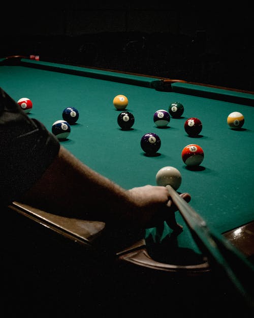 A Person Playing Billiards