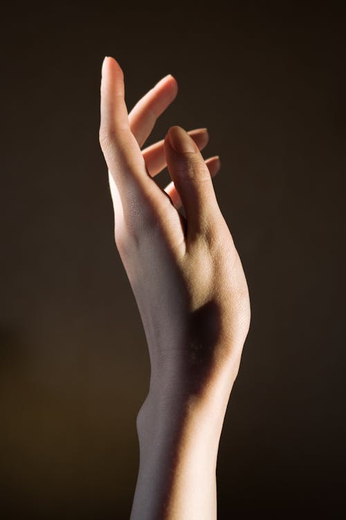Woman's Hand With Black Background